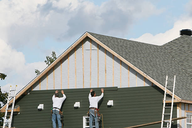Professional Siding technician working in Rockville, VA